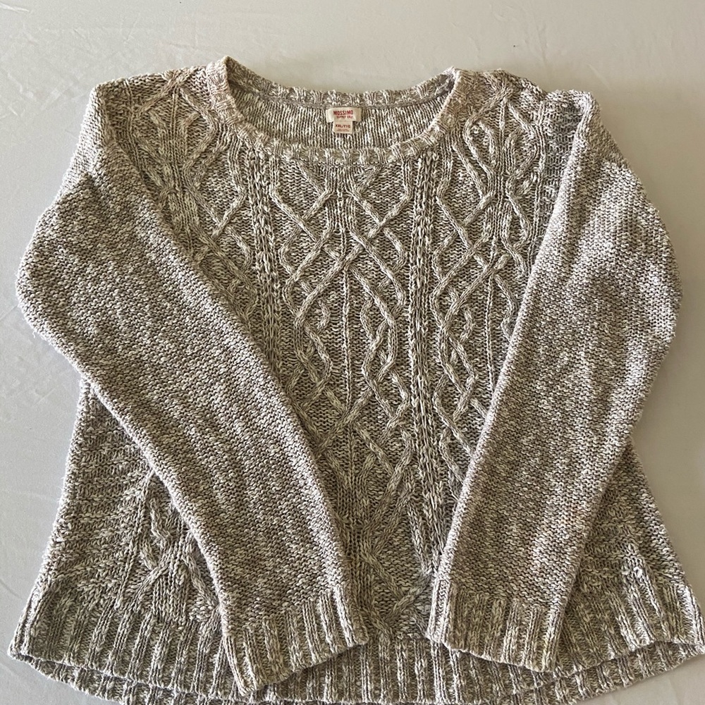 Tan cable-knit sweater